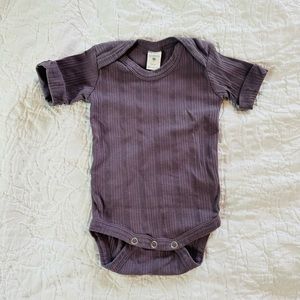 Kate Quinn Ribbed Onesie